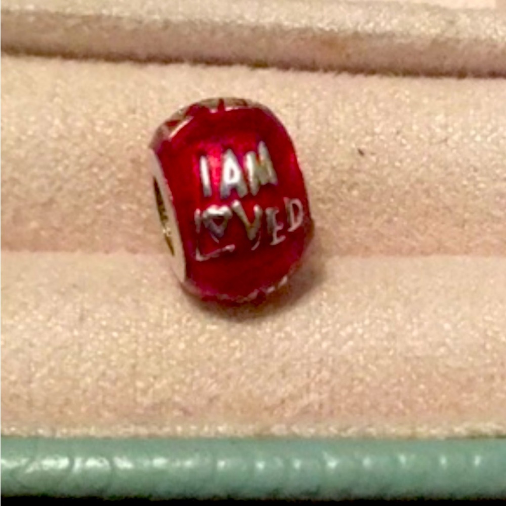 Helzberg brand charms for Pandora bracelets.”I am loved” & Swarovski beads